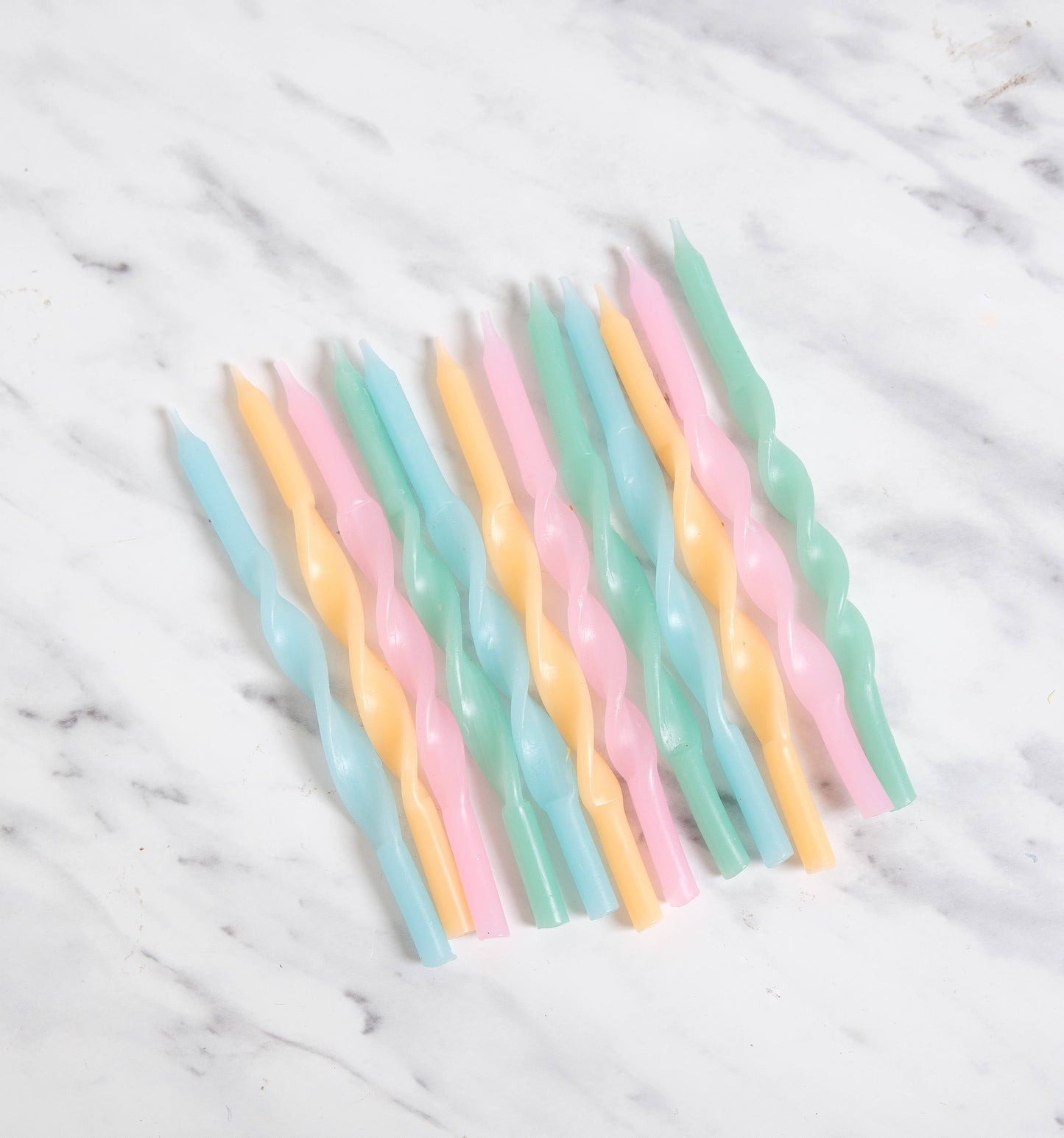 TWISTED PASTEL RAINBOW 12 CANDLE SET